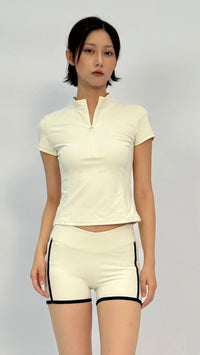 Becca Cream Quarter-Zip Short Sleeve Top